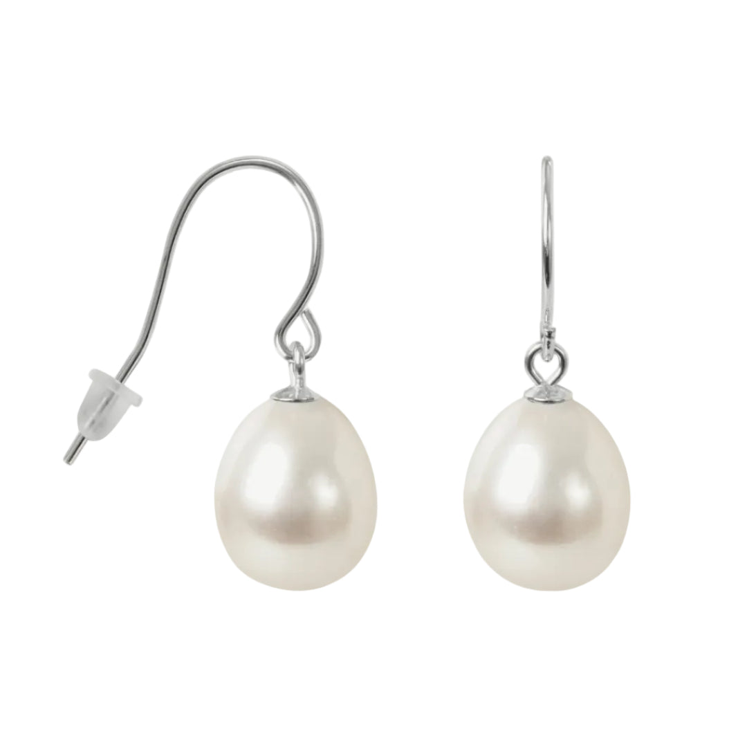 Pearl earrings with silver hooks on a white background
