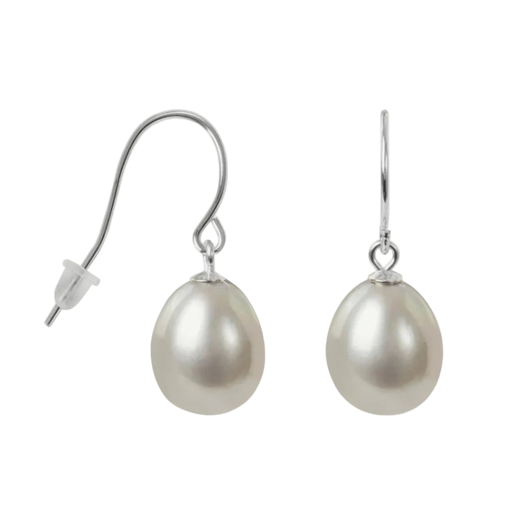 Pearl earrings with silver hooks on a white background