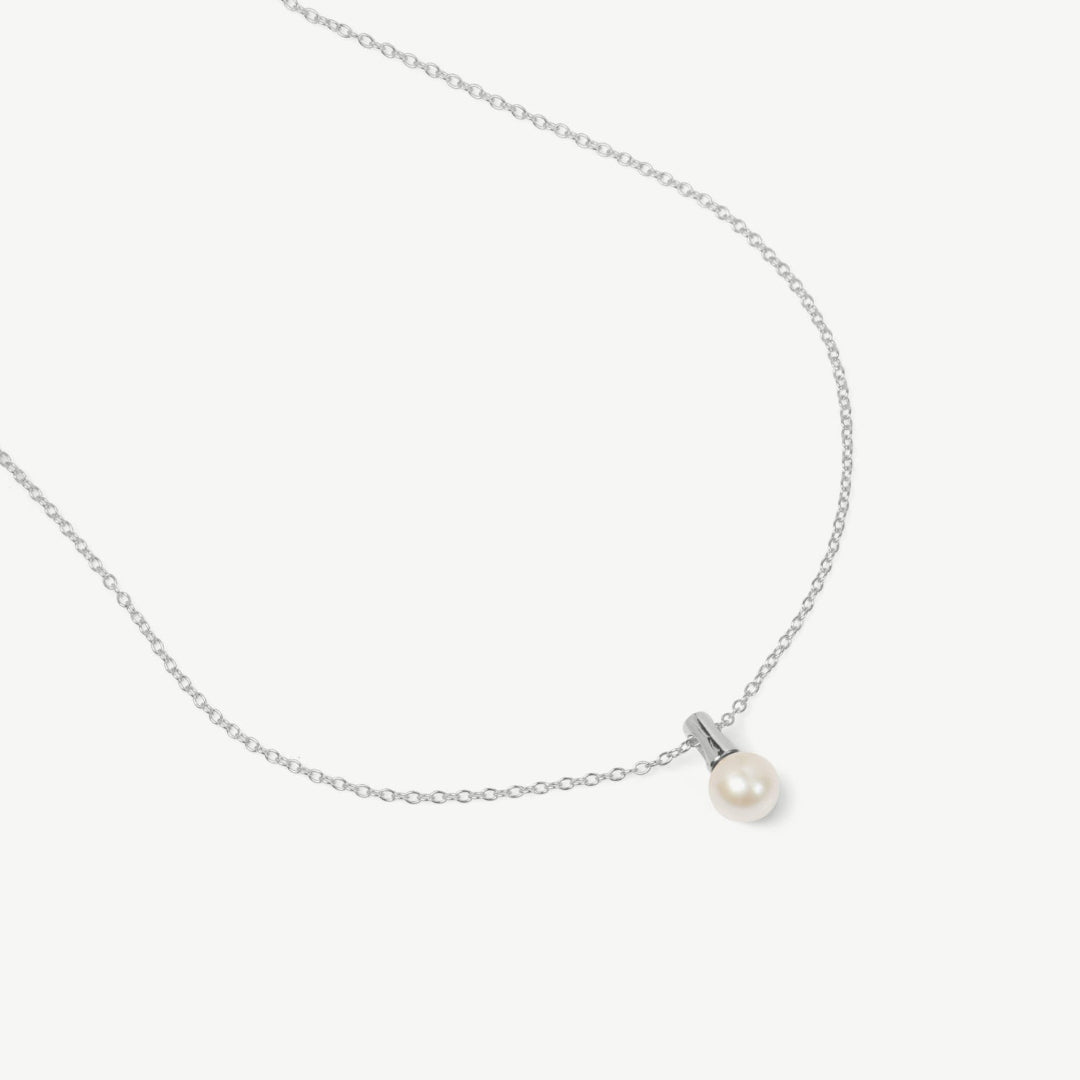Pearl necklace on a white background