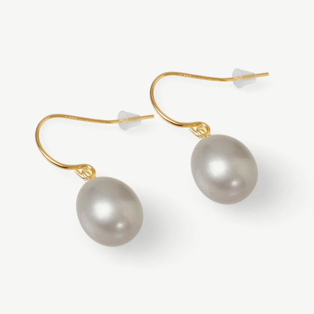 Pearl earrings on a white background
