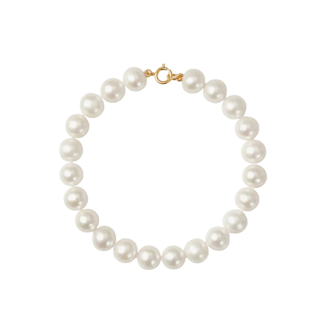 Pearl bracelet with a gold clasp on a white background