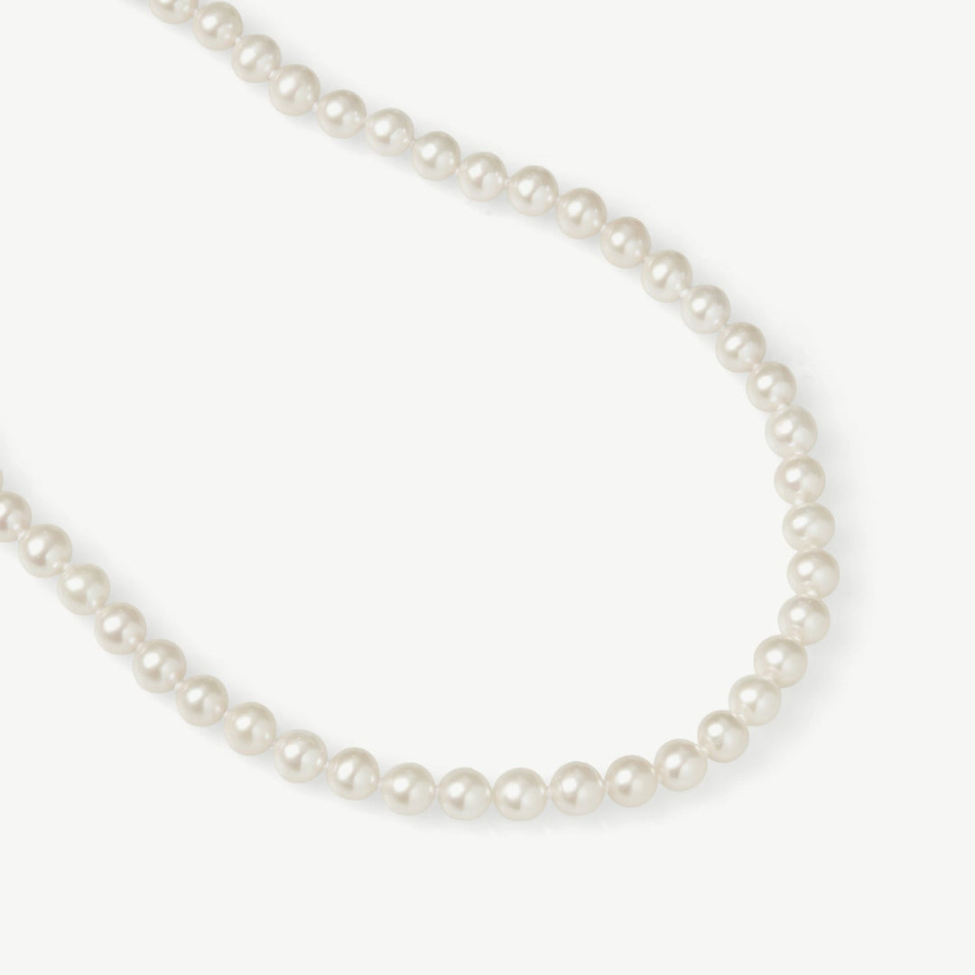Pearl necklace on a white background