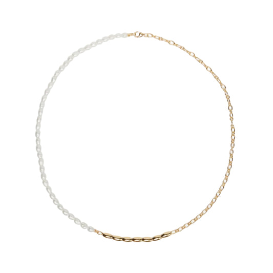 Gold and pearl necklace on a white background
