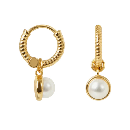 Gold hoop earrings with pearl drops on a white background