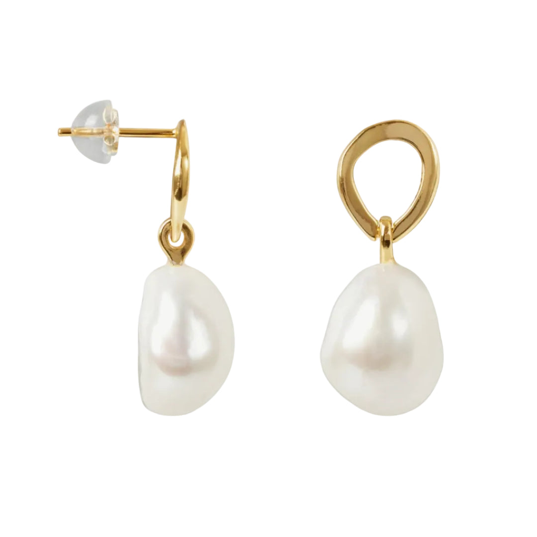 Pearl earrings with gold hooks on a white background
